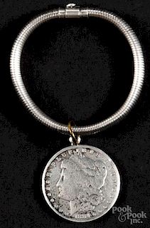 Sterling silver bracelet with an 1884 Morgan dollar charm, bracelet - 7'' l., 0.55 ozt.