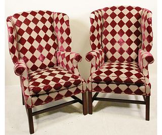 PAIR OF UPHOLSTERED WING BACK CHAIRS