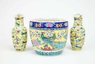 Pair of Yellow-Ground Famille Rose Porcelain Baluster-Form Vases and Caps, and a Japanese Yellow-Ground Jardinière, in the Famille Rose Style