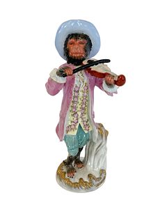 A Porcelain Figurine of ''A Musician Monkey''