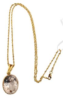 22 Karat Gold Champagne Color Oval Stone , with 18 Karat gold rope chain, length 17 1/2 inches, total weight 13.6 grams.