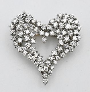 18 Karat White Gold and Diamond Brooch, heart shaped, height 7/8 inches, 5.9 grams.