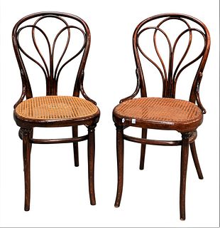 Set of Six Bentwood Thonet Chairs, having caned seats, height 36 inches.