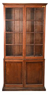 Mahogany Two Part Cabinet, having seven panel glazed doors over two doors, height 80 1/2 inches, width 39 1/2 inches.