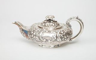 George IV Repoussé Silver Footed Teapot