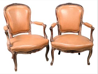 Pair of Louis XV Style Leather Upholstered Fautoils, height 34 1/2 inches, width 27 inches.