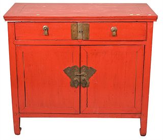 Chinese Red Painted Cabinet, having two drawers over two doors, height 35 1/2 inches, width 40 1/4 inches.