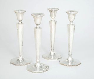 Set of Four B & M Monogrammed and Weighted Silver Table Candlesticks