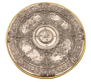 Large Silver Plated Charger, having embossed figural landscape scenes, scrolling foliate border with putti figures, diameter 19 1/2 inches.