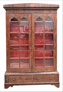 Empire Mahogany Three Part Bookcase/Cabinet, with two arched top doors over two drawers, circa 1840, height 90 inches, width 53 1/2 inches, depth 15 1