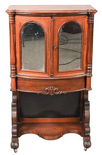 Rosewood Music Cabinet, 19th century, having two mirrored doors, height 46 inches, width 27 inches.