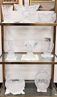 Eight Piece Group of Cut Glass, to include a small two part punch bowl, handled basket, oblong center serving compote, two bowls, pitcher with sterlin