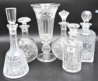 Six Piece Glass Group, to include Baccarat decanter, cut glass decanter, three other decanters and a large crystal vase, height 13 inches.