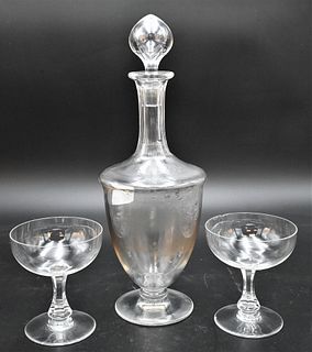 12 Piece Baccarat Group, to include a pair of bottles and 10 stems, height 4 1/8 inches.
