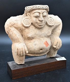 Terracotta Yaksha, India or Southeast Asia, 6th century, on wood base, height without base 8 1/2 inches.