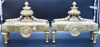 Pair of Brass Neoclassical Chenets, with urns and wreathing, height 12 inches, width 13 1/2 inches.