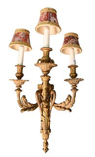 Large Louis XVI Gilt Bronze Sconce, having urn finial over foliate swags above torch form backplate with scrolling candle arms, along with swag and le