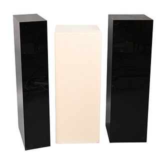 Three Pedestals, to include one white lacquered, along with two black plexiglass pedestals, white height 36 inches, top 14" x 14".