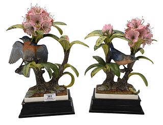 Pair of Porcelain Boehm Bird Figures, having blossoming flowers with birds, height 12 inches, 14 inches.