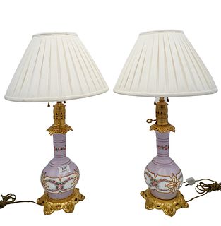 Pair of French Porcelain Oil Lamps, having bronze mounts made into table lamps, height 23 1/2 inches.