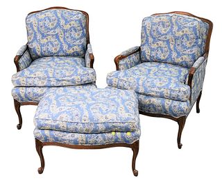 Pair of Louis XV Style Bergeres and Ottomans, all having custom upholstery, height 36 inches, width 27 inches.