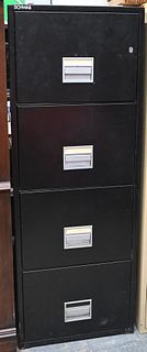 Schwab Four Drawer Fireproof File Cabinet, height 54 inches, width 19 1/2 inches.