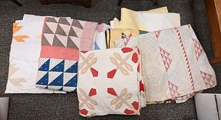 Group of Nine Patchwork Quilts, largest 6' 2" x 6' 8".