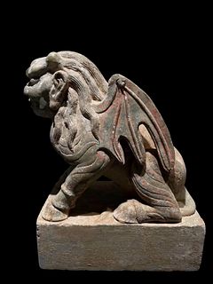 A Carved Stone Mythical Beast Figurine