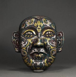 A Bronze with Silver Inlay Face Mask