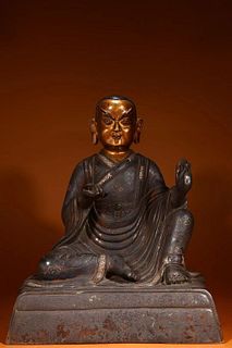 A Bronze with Silver Inlay Enlightened Monk Statue