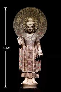 A Carved HanBai Jade Buddha Statue