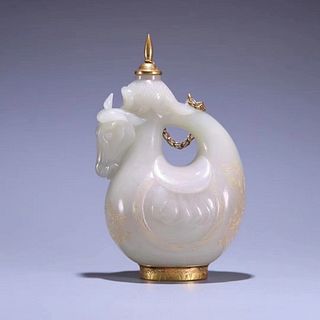 A Carved Jade Pot with Gold Lid and Base