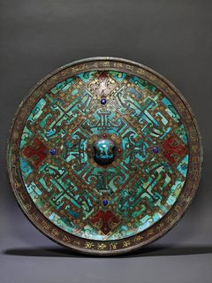A Bronze With Gold and Turquoise Inlay Round Mirror