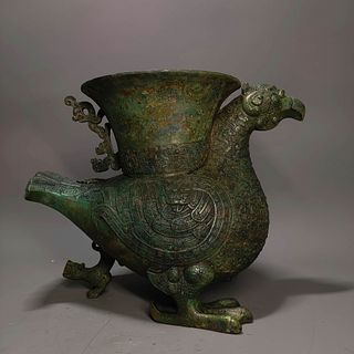 A Bronze bird Shaped cup