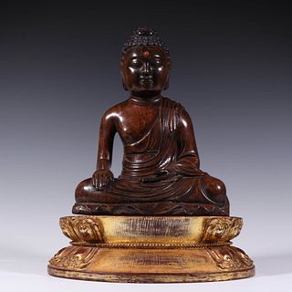 A Carved Hardwood Seated Buddha Statue