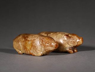 Two Carved Jade Piglet Ornaments
