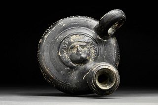ANCIENT GREEK GLAZED GUTTUS WITH GORGON HEAD