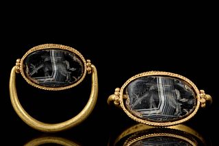 GRECO-PHOENICIAN GOLD RING WITH PEGASUS ONYX INTAGLIO
