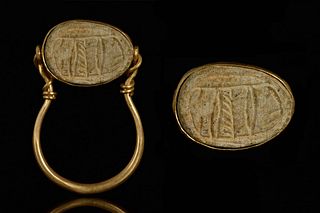 SWIVEL GOLD RING WITH EGYPTIAN SCARAB