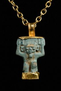 EGYPTIAN FAIENCE SHU AMULET IN LATER GOLD PENDANT
