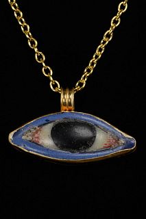 EGYPTIAN GLASS EYE INLAY IN LATER GOLD PENDANT