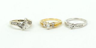 Group of Three Diamond and Gold Rings