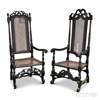 Two Charles II-style Carved and Caned Armchairs