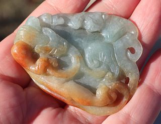 Carved Russet and Celadon Jade Pendant.