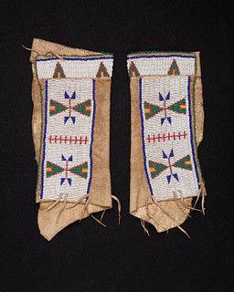 A pair of Sioux beaded hide women's leggings