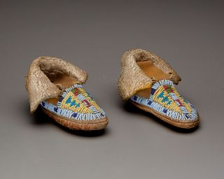 A pair of Kiowa child's beaded moccasins