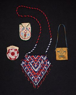 A group of American Indian beaded hide bags