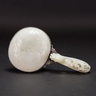A CARVED WHITE JADE MOUNTED SILVER HAND MIRROR 