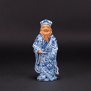 A CHINESE BLUE AND WHITE FIGURE 