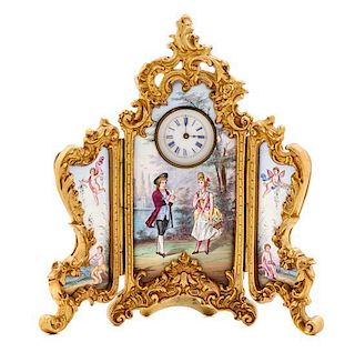 * A Continental Enamel and Gilt Metal Three Panel Table Clock Height 4 3/4 inches.